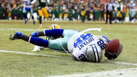 Dez Bryant's 31-yard catch in the 4th quarter was reversed after a challenge was issued by Packers coach Mike McCarthy