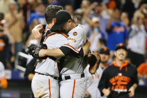 Buster Posey (left),hugs Chris Heston following his no-hitter as the Giants win 5-0 Tuesday in New York.