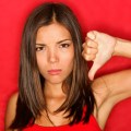 Unhappy thumbs down&nbsp;woman